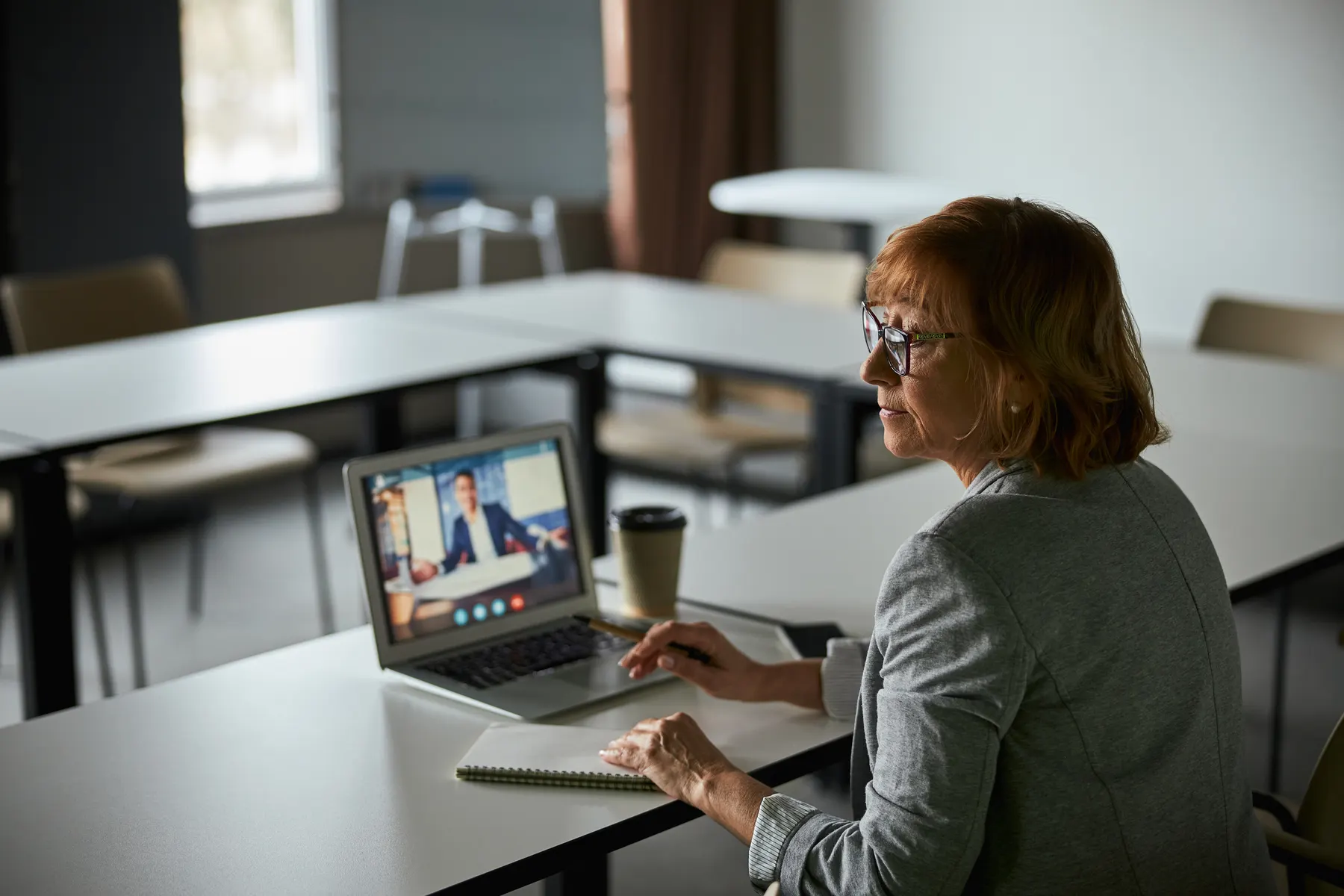 A business owner attending an online training session
